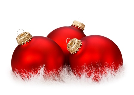 three red Christmas ballsの写真素材