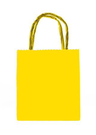 yellow shopping bag isolatedの写真素材