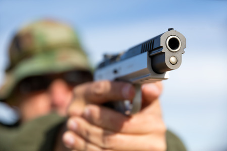 Man with gunの写真素材