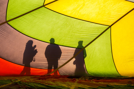 People outside of hot air balloonの写真素材