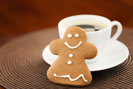 Gingerbread cookie with cup of coffeeの写真素材