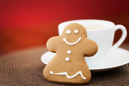 Gingerbread cookie with cup of coffeeの写真素材