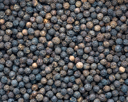 Black peppercorn backgroundの写真素材