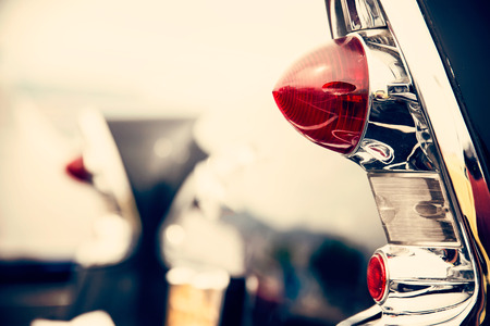 Photograph of classic car with close-up on taillightsの写真素材