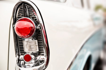 Photograph of classic car with close-up on taillightsの写真素材