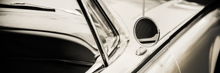 Classic car photographed from the side.