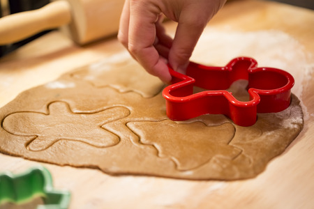 Making Christmas gingerbread cookiesの写真素材
