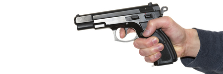Man's hand holding gun isolated on white background