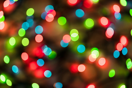 Colorful Christmas lights bokeh backgroundの写真素材