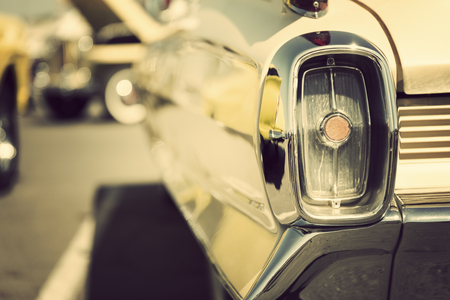 Classic car with close-up on tail lightsの写真素材