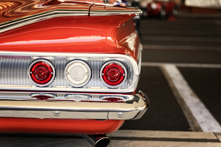 Classic car with close-up on tail lightsの写真素材