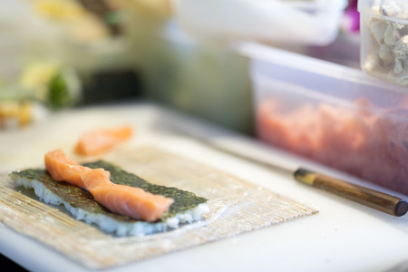 Sushi preparation in japanese restaurantの写真素材