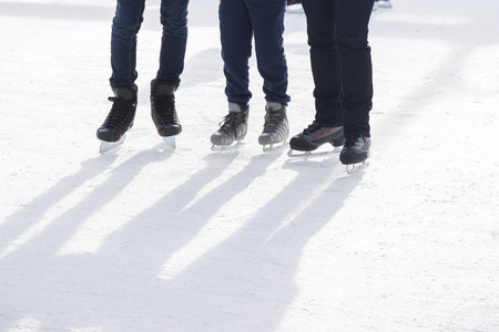 People ice skating on ice rink