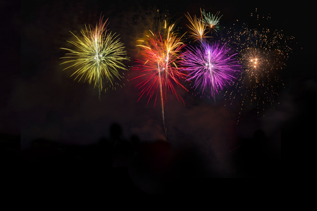 Fireworks display over dark skyの写真素材