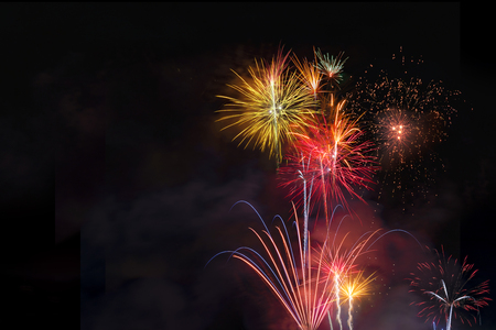 Fireworks display over dark skyの写真素材