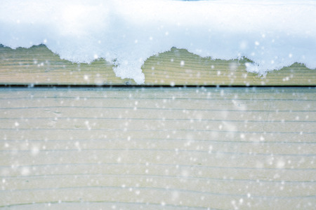 Snow over wooden texturedの写真素材