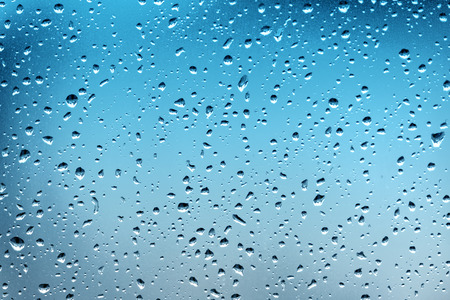 water drops on blue backgroundの写真素材