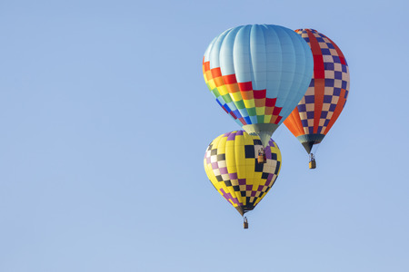 Colorful hot air balloons in the skyの写真素材