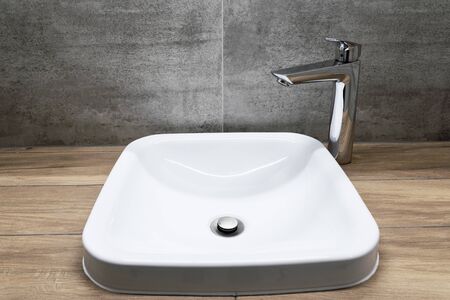 sink and faucet in bathroomの写真素材