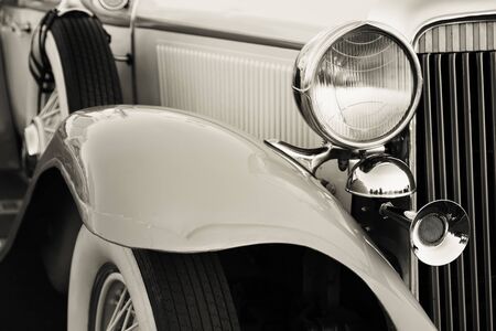 Old vintage car headlights close-upの写真素材