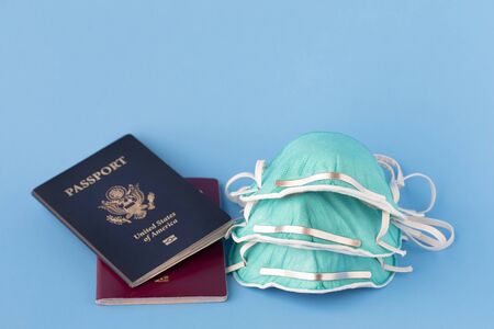 passports and flu, virus masks to protect against coronavirus, global epidemic concept