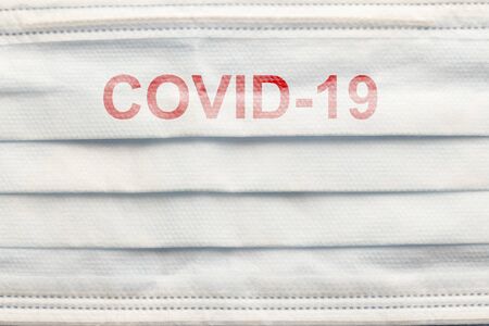 medical mask to protect against covid-19 flu, coronavirus global pandemic conceptの写真素材