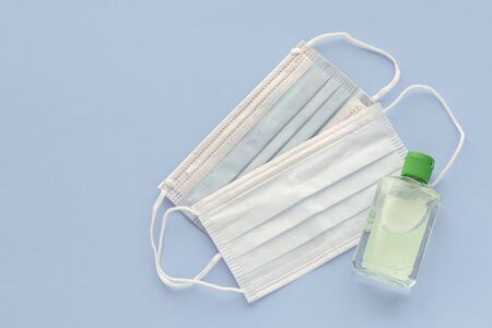 medical mask to protect against covid-19 flu with gel hand sanitizer, coronavirus conceptの写真素材