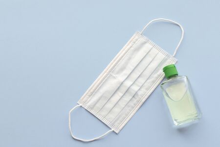 medical mask to protect against covid-19 flu with gel hand sanitizer, coronavirus conceptの写真素材
