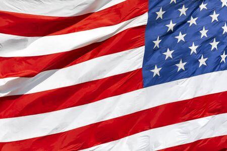 American flag waving in the wind, US flag motion close-upの写真素材