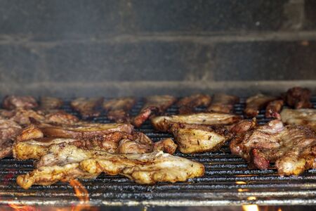 Meat on the barbecue grill, beef steakの写真素材