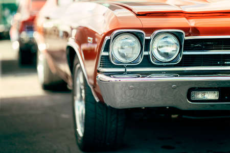 Classic car show, close-up on vehicle headlights, vintage colorの写真素材