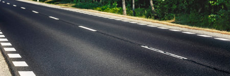 Asphalt road in the forest. Panoramic image of asphalt road.の写真素材