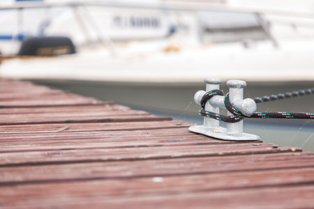 Close up of mooring bollard in a yacht marinaの写真素材