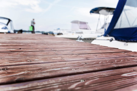 Wooden pier on a yacht in the sea. Blurred backgroundの写真素材