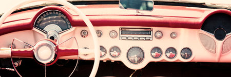 Vintage car dashboard and steering wheel. Retro car vintage style.の写真素材
