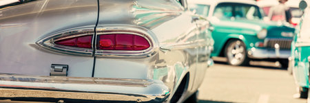 Vintage car headlight close-up. Retro car background.の写真素材