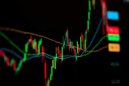 Candle stick graph chart with indicator showing bullish point or bearish point, up trend or down trend of price of stock market or stock exchange tradingの写真素材