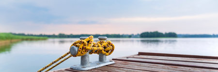 Mooring bollard on a pier with a blurred backgroundの写真素材