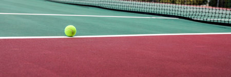 Tennis ball on the court. Selective focus on the ballの写真素材