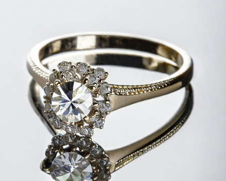 Jewelry ring with diamonds on a white background, close upの素材