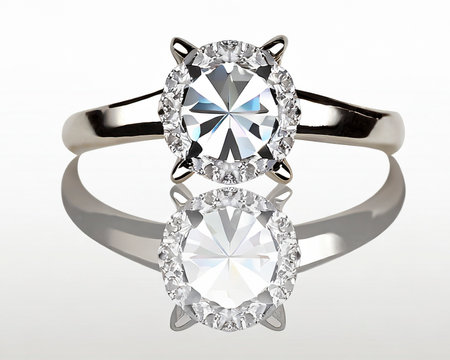 Jewelry ring with diamonds on a white background. 3d renderの素材