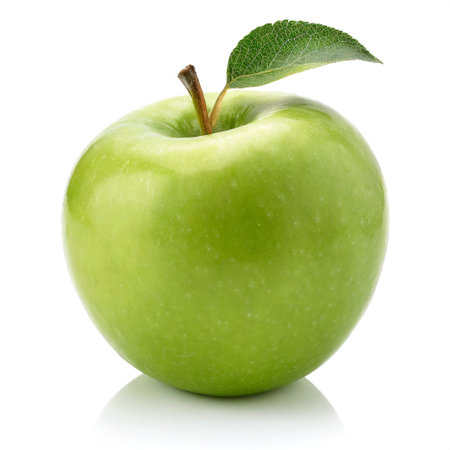 Green apple with leaf isolated on white backgroundの素材