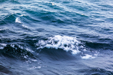 Waves on the surface of the sea as an abstract background.