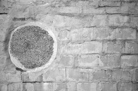White black gray brick concrete wall, floor with dots, paint and cracks, texture background.の写真素材