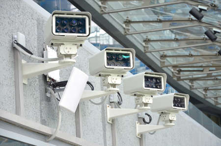 Security CCTV IR cameras on the building, CCTV mounted on the wallの写真素材