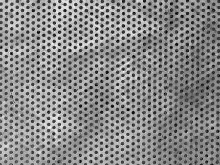 White black grey wall with dots and holes on the surface, texture background, perforationの写真素材