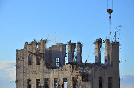 Building destruction, demolition of a building by a crane