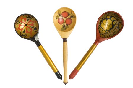 Three russian traditional wooden spoons isolated on white backgroundの写真素材