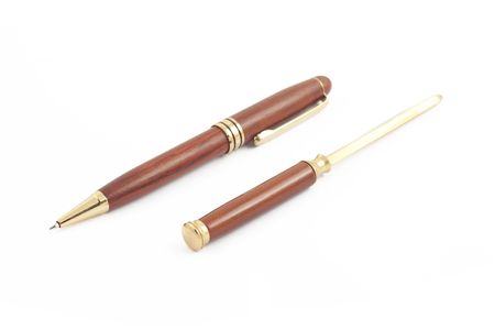 Pen and knife for envelopes on white backgroundの写真素材