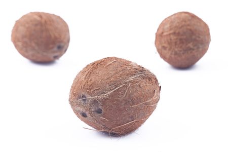 Three coconuts on white backgroundの写真素材